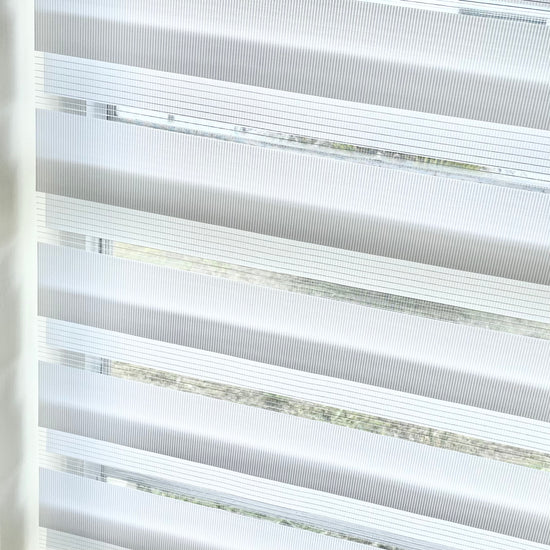 Create an airy atmosphere with this light yet durable fabric option. With its vibrant color pallet and a delicate sheer band, it will sure give your windows a trendy look. Plus it's super easy to clean and maintain – what a bonus!